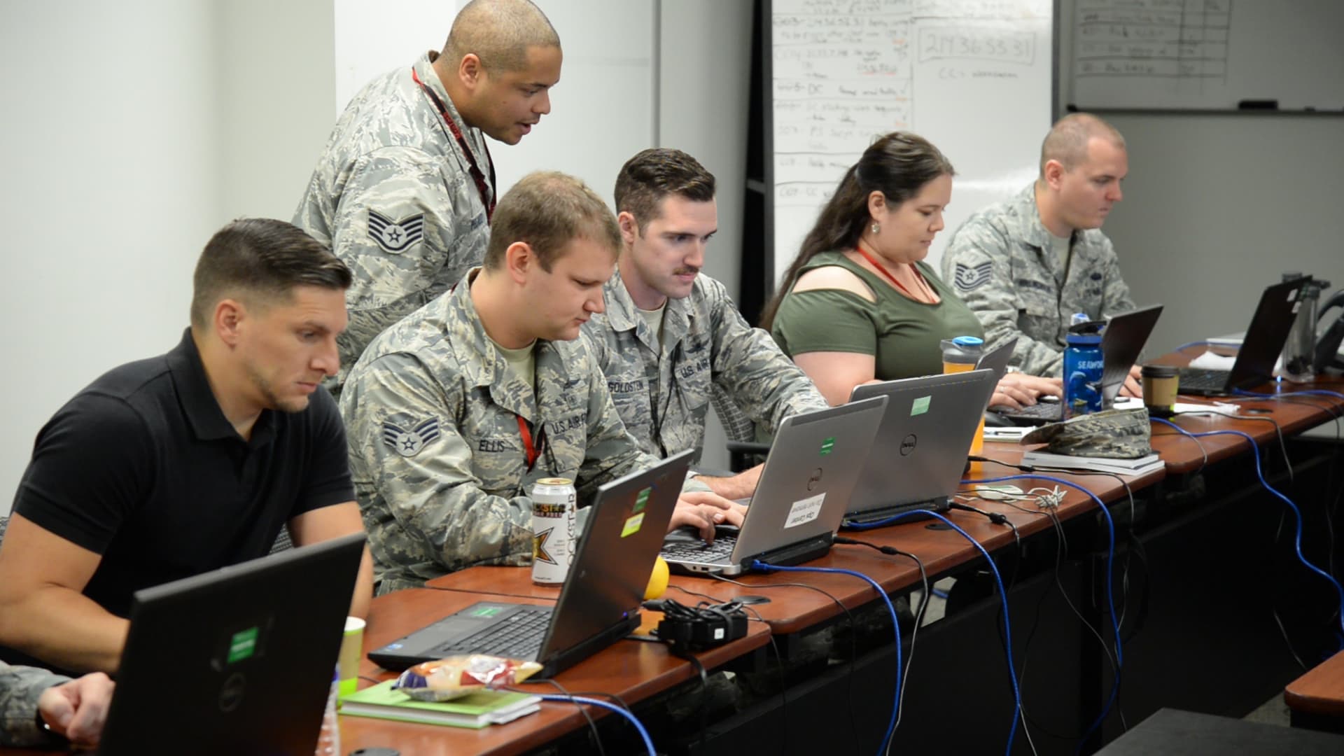 DISA employees working on-site in office