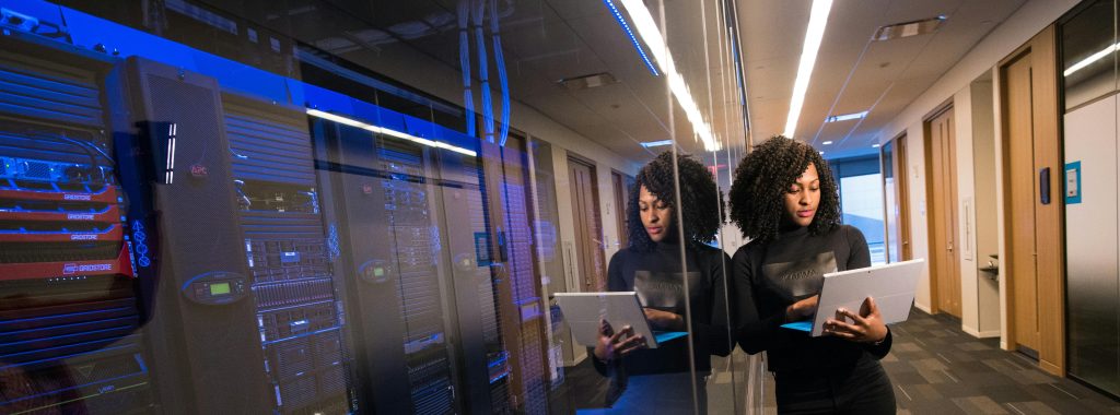 Office Employee Working On Servers