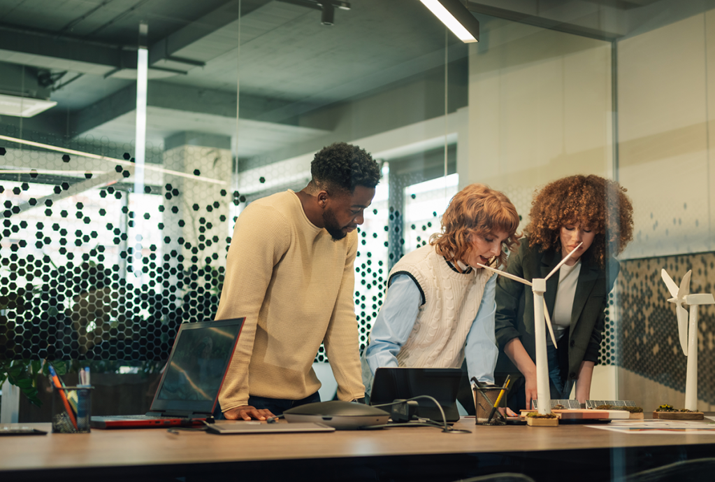 Group of employees working on a solution