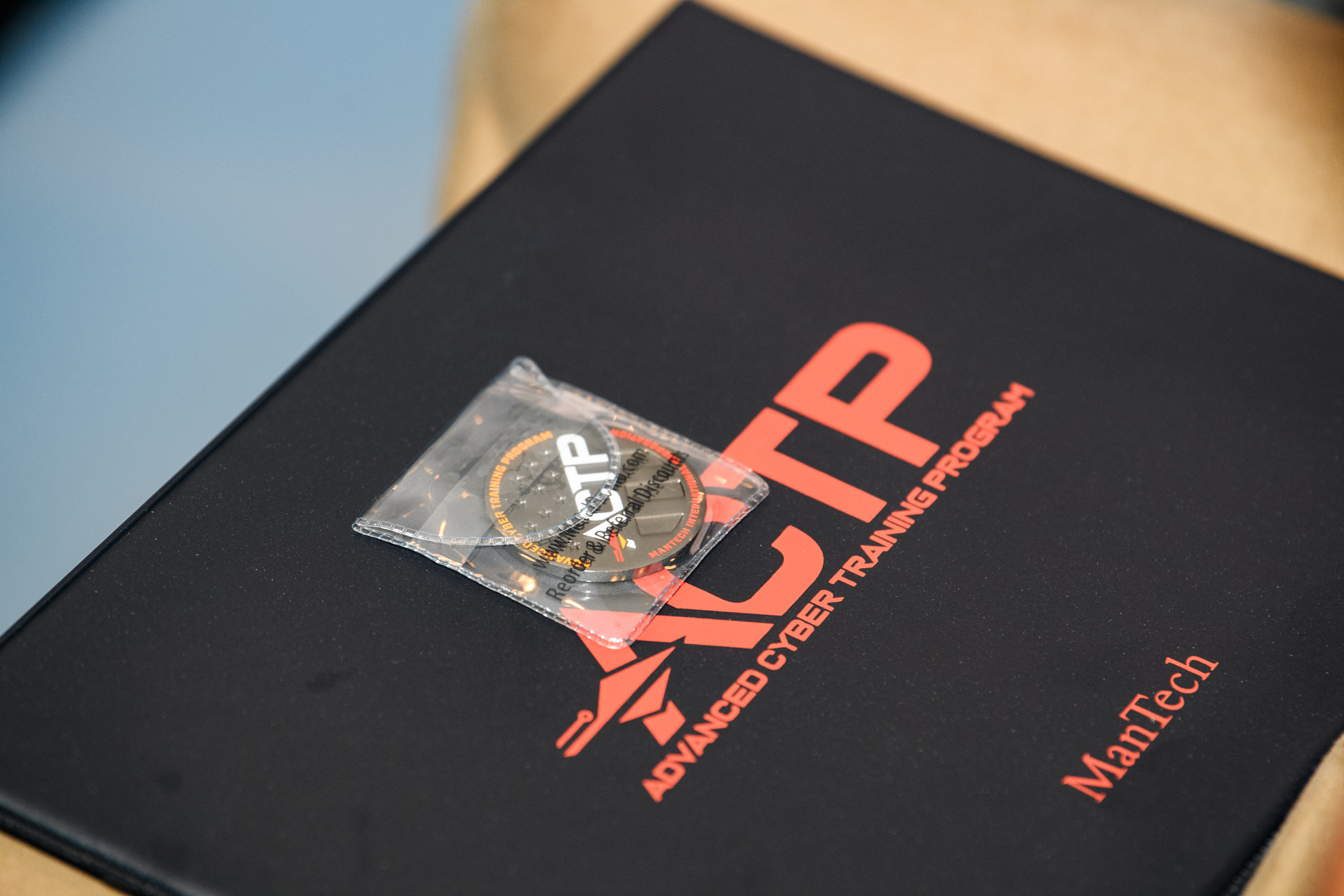 Close-up of a digital badge on a laptop screen