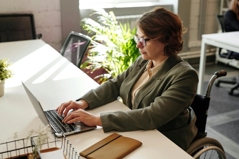 Lady working on a Laptop